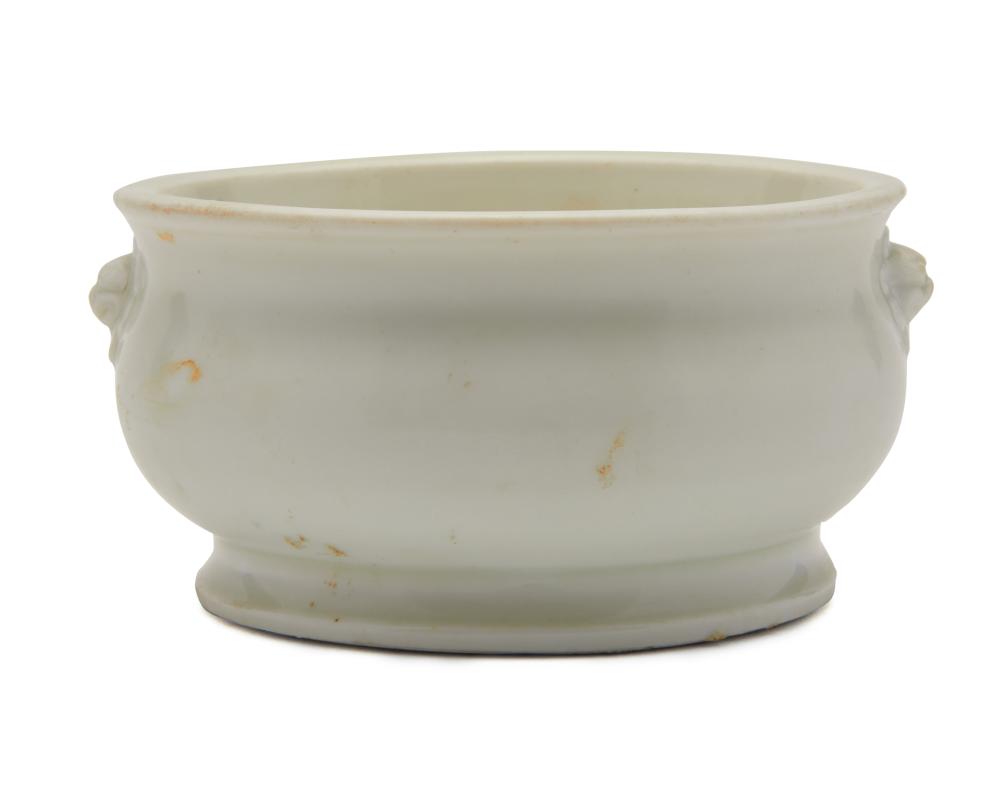 Appraisal: Chinese Blanc de Chine Low Bowl with lion head handles