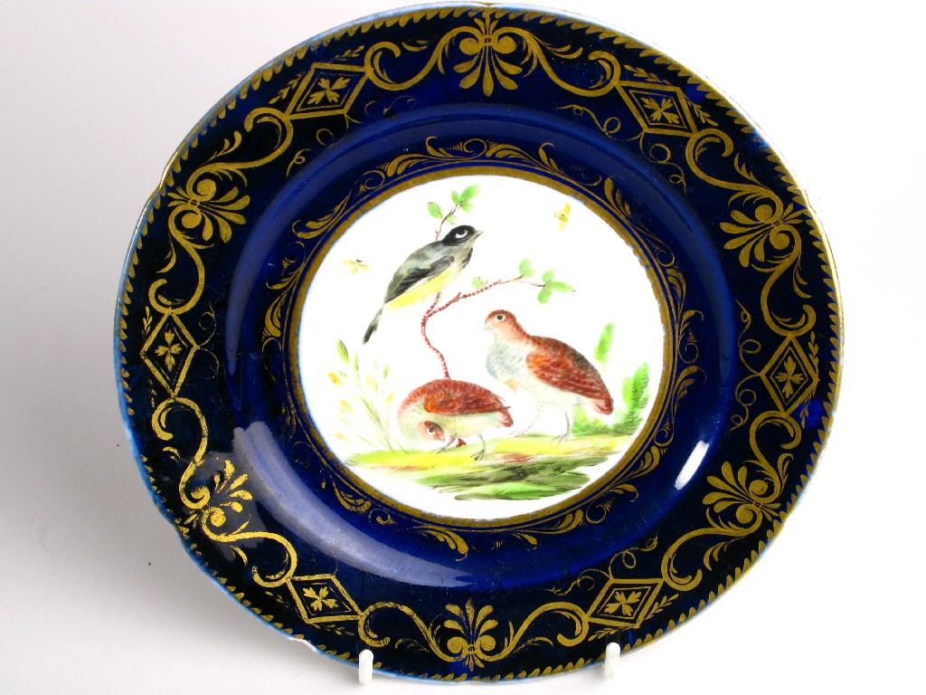 Appraisal: A Coalport Plate painted pair of quails and bird on