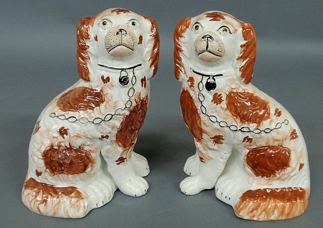 Appraisal: Pair of Staffordshire red Spaniels with yellow eyes c h