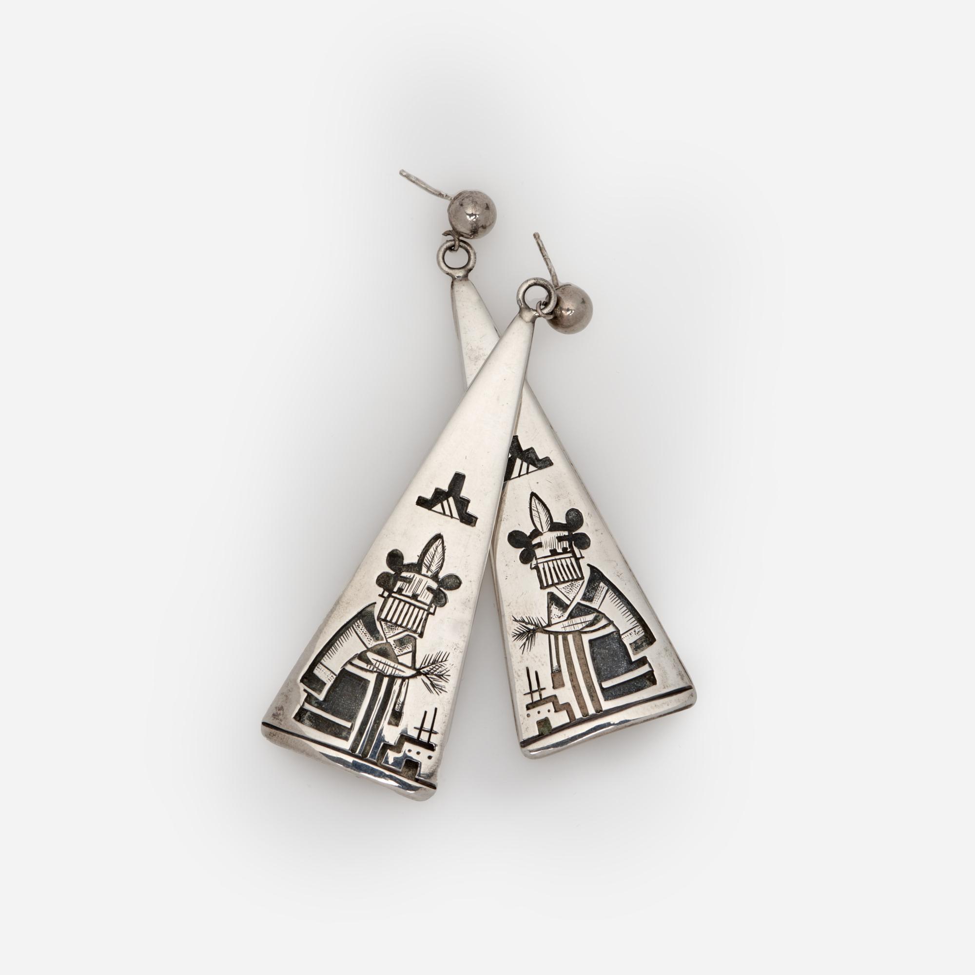 Appraisal: VICTOR COOCHWYTEWA SILVER OVERLAY EARRINGS FROM KOPAVI A pair of