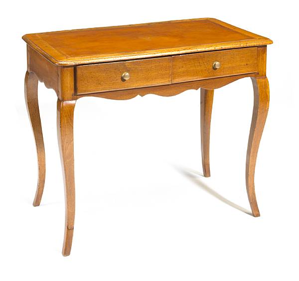 Appraisal: A Louis XV walnut table crire The rectangular top with