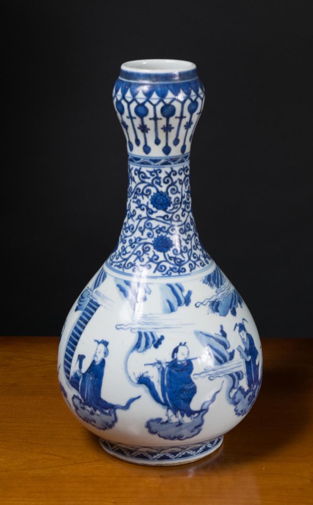 Appraisal: CHINESE BLUE AND WHITE PORCELAIN VASE of garlic-head form hand