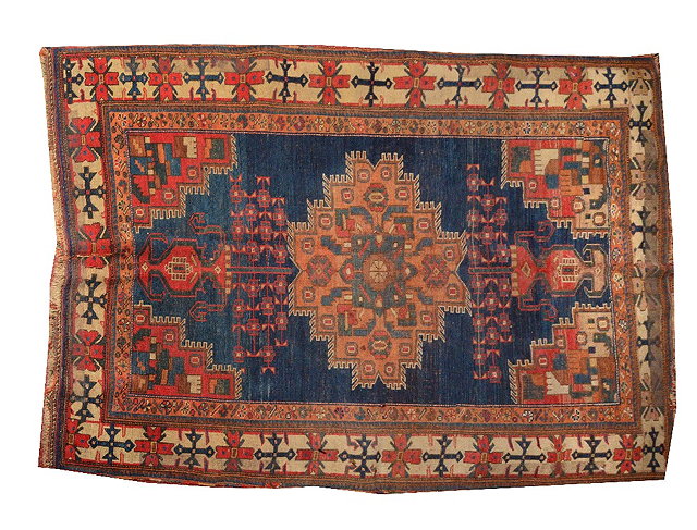 Appraisal: AN AFSHAR BLUE GROUND RUG with a central polychrome medallion