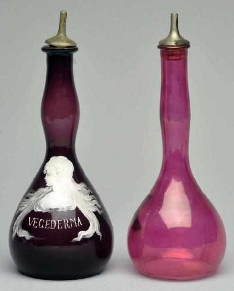 Appraisal: Lot of Tonic Bottles Includes one pink glass bottle and