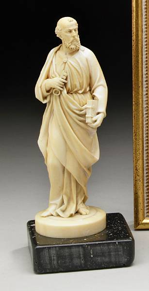 Appraisal: A German carved ivory figure of St Peter probably Erbach