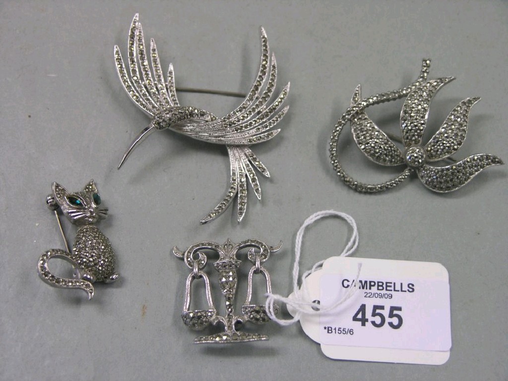 Appraisal: Four marcasite brooches in the forms of a cat a