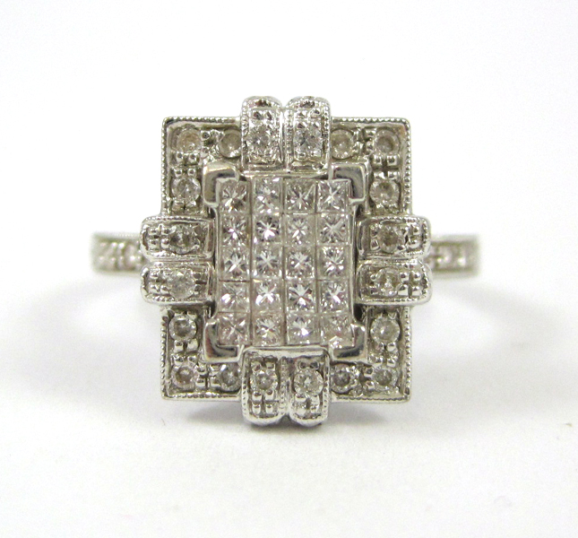 Appraisal: DIAMOND AND EIGHTEEN KARAT WHITE GOLD RING pave' set with