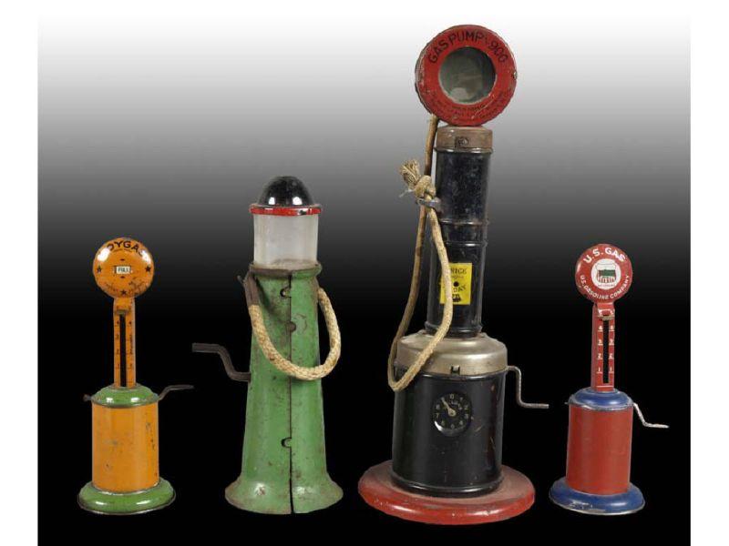 Appraisal: Lot of Tin Pressed Steel Gas Pump Toys Description ''