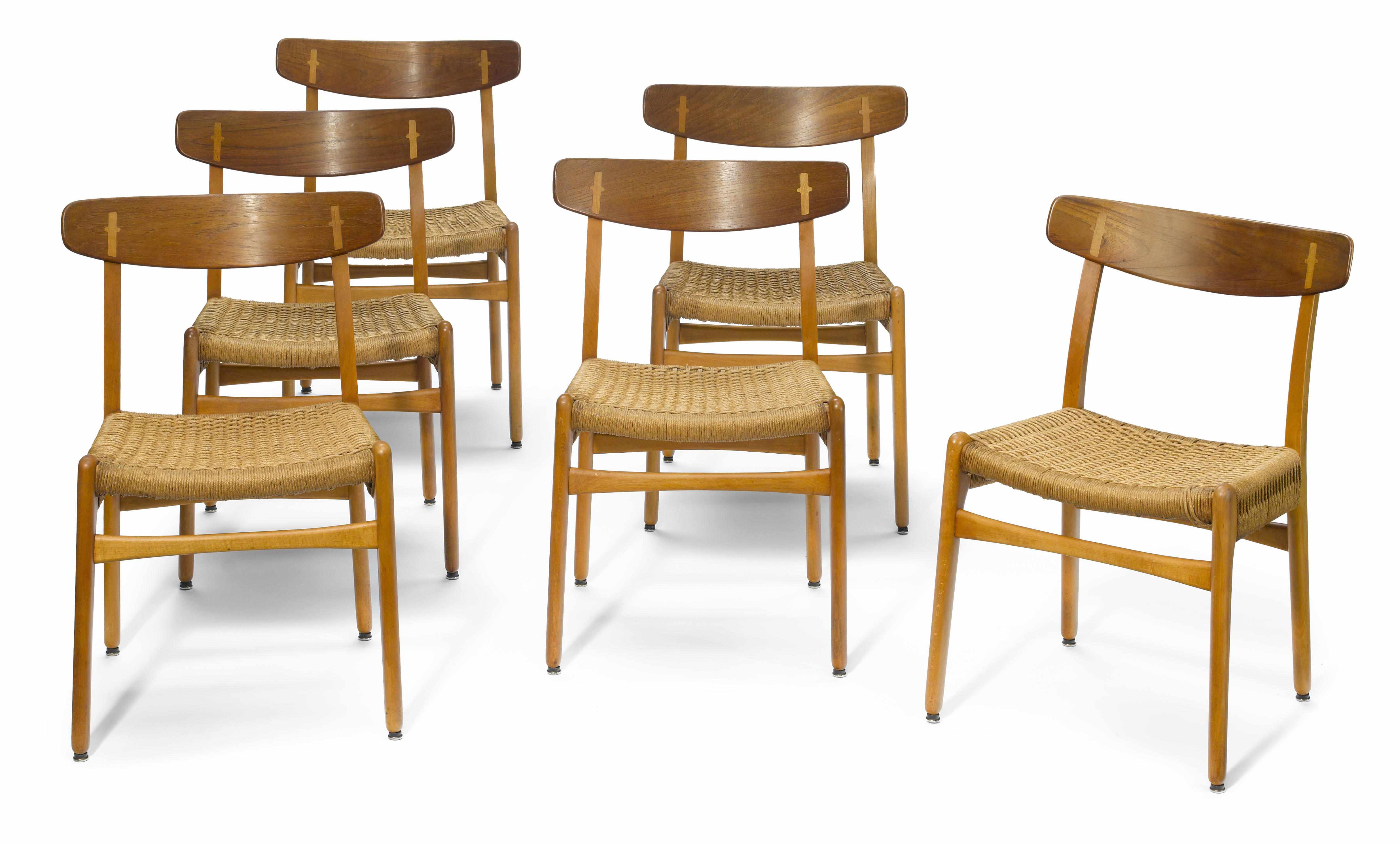 Appraisal: A set of six Hans Wegner oak and teak side