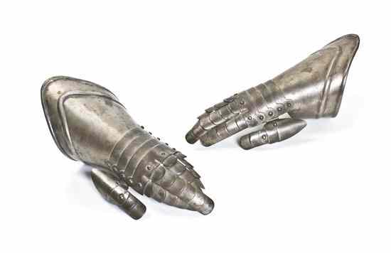 Appraisal: A Pair of Iron Gauntlets with articulated fingers together with