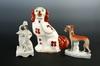 Appraisal: LOT OF PIECES OF STAFFORDSHIRE - Seated spaniel man with