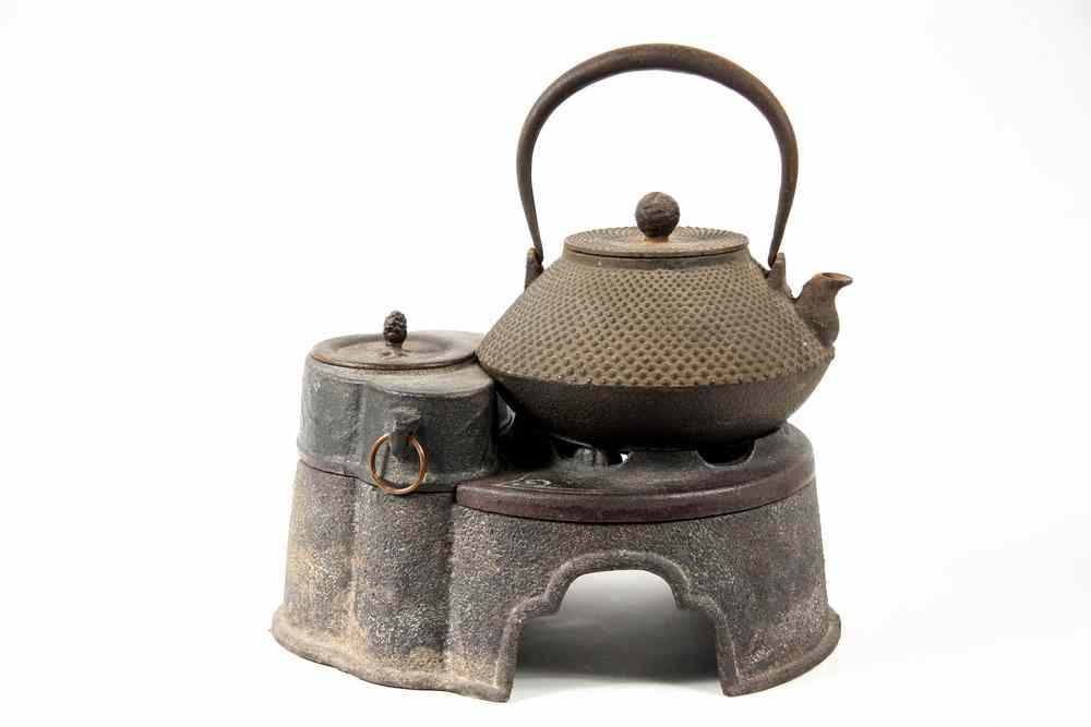 Appraisal: JAPANESE TEA POT HIBACHI - Meiji Period Cast Iron Tea