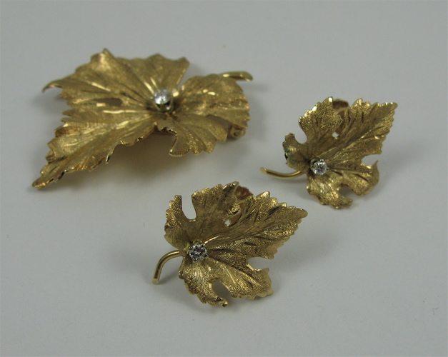 Appraisal: THREE PIECE DIAMOND AND K GOLD JEWELRY including a leaf