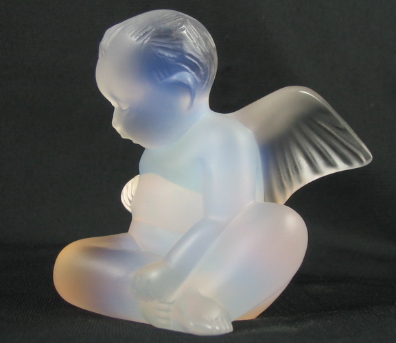 Appraisal: A LALIQUE OPALESCENT FIGURE of a precocious winged angel seated