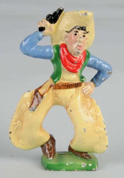 Appraisal: Cast Iron Cowboy with Six Shooter Paperweight Description Made by