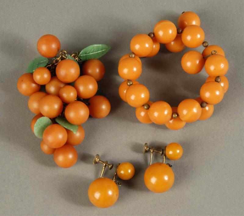 Appraisal: Bakelite Bracelet Pin Earrings Set Description In butterscotch and orange