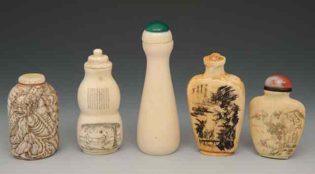 Appraisal: A CHINESE PLAIN IVORY SNUFF BOTTLE of tapered bottle form