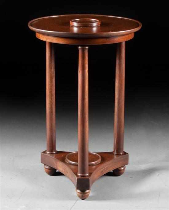 Appraisal: French Empire style mahogany fern stand circular top supported by