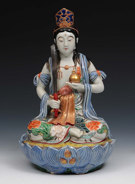 Appraisal: A Japanese Kutani porcelain figure of BenzaitenMeiji periodseated upon a