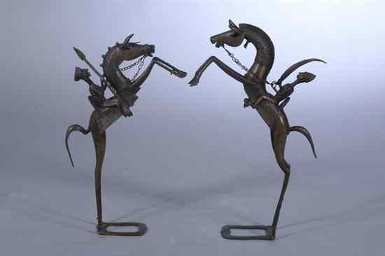 Appraisal: TWO WEST AFRICAN BENIN STYLE BRONZE EQUESTRIAN FIGURES Cast to