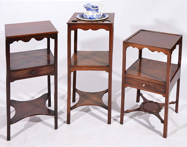 Appraisal: A GEORGIAN MAHOGANY SQUARE WASH STAND with undertiers together with