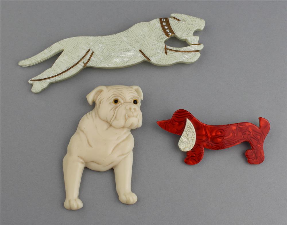 Appraisal: LEA STEIN RED DACHSHUND PIN AND WHITE LEAPING LEOPARD PIN