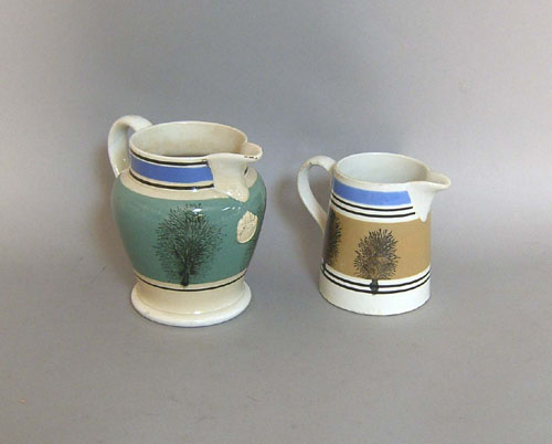 Appraisal: Two mocha pitchers h and h th c with seaweed