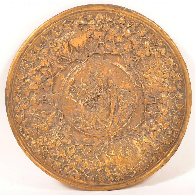 Appraisal: th Century brass Plate with Embossed Scenes th Century brass