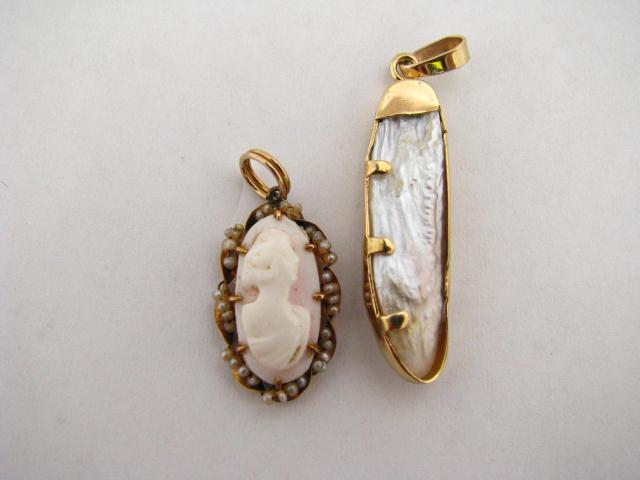 Appraisal: Two pendants including unmarked K yellow gold and freshwater pearl