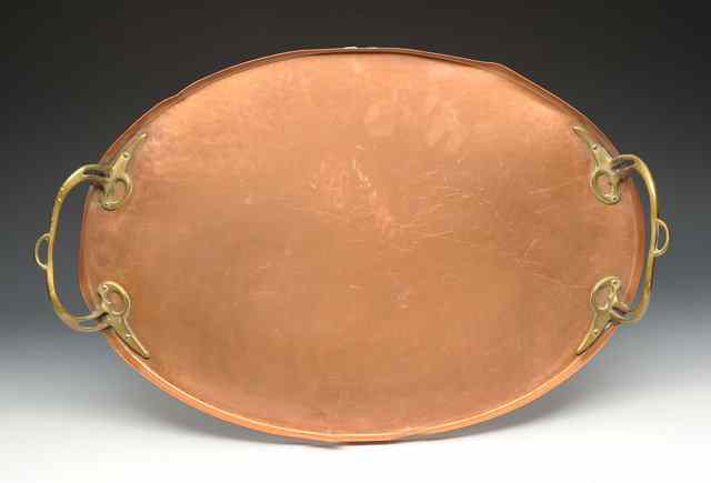 Appraisal: A WMF Art Nouveau oval copper tray with stylised brass