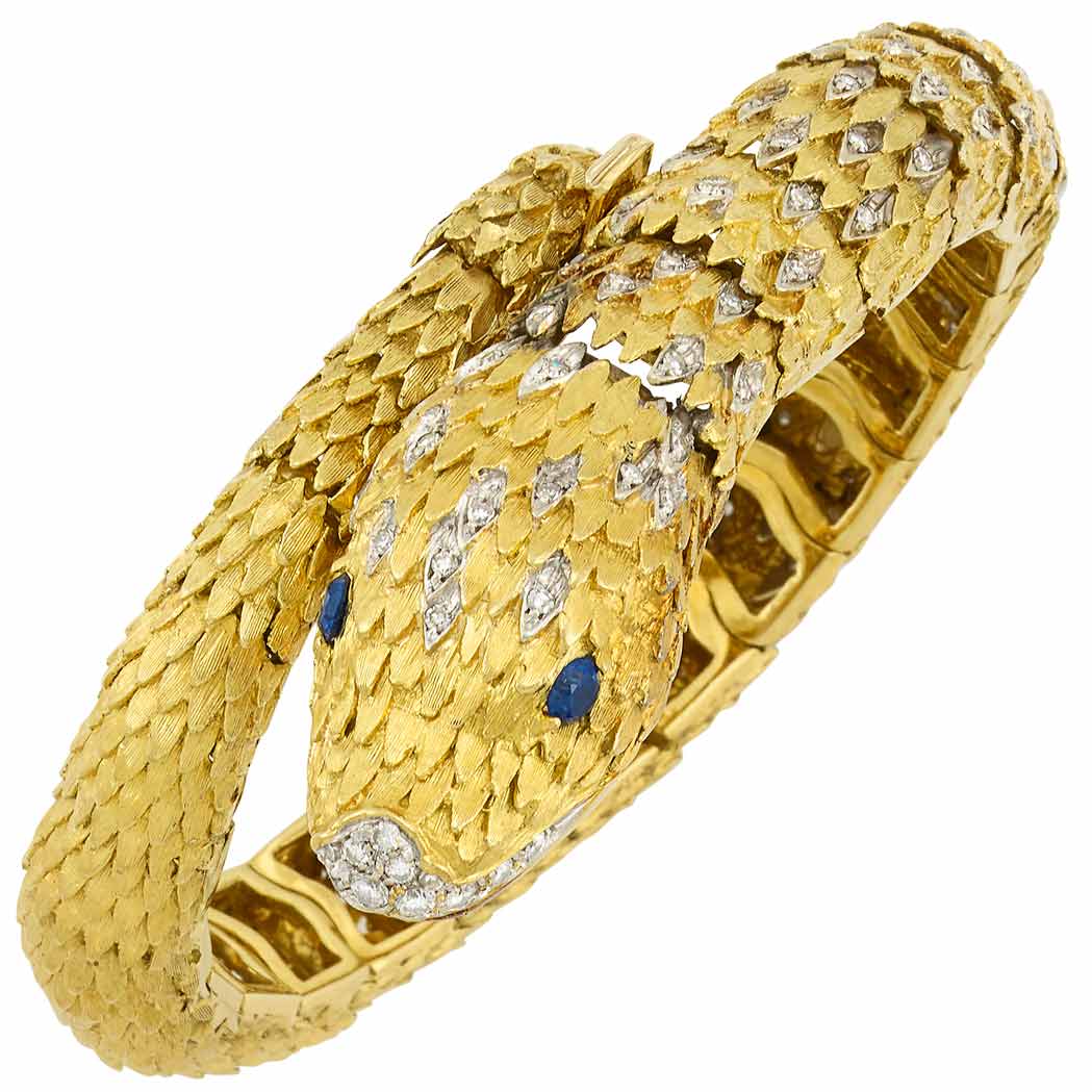 Appraisal: Two-Color Gold Diamond and Sapphire Snake Bracelet kt round diamonds