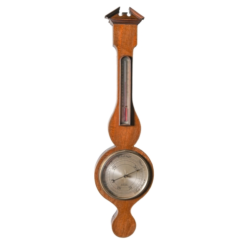 Appraisal: A mahogany and broken line inlaid aneroid barometer J Perry