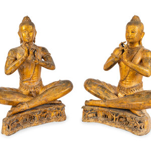 Appraisal: A Pair of Thai Gilt Bronze Figures of Musicians and