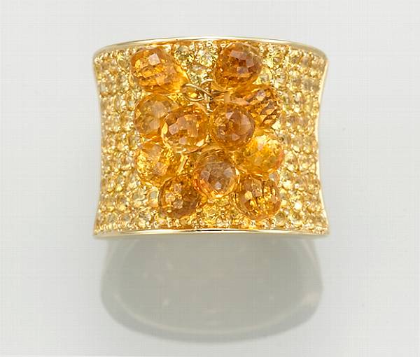 Appraisal: A citrine yellow sapphire and eighteen karat gold ring estimated