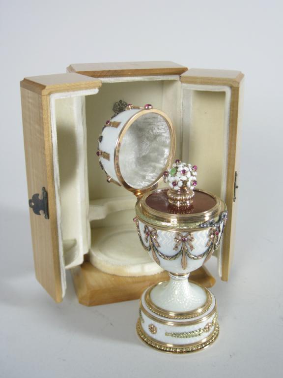 Appraisal: A Faberge style gold and enamel Egg the hinged lid