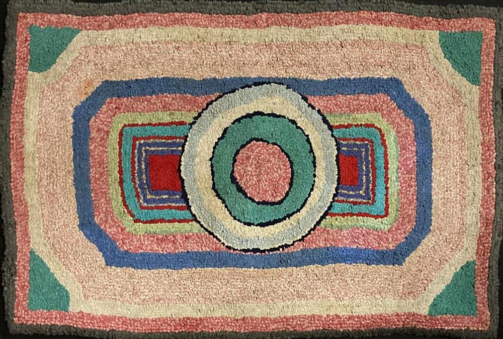 Appraisal: Colorful Folk Art Hooked Rug mounted on wooden frame Use