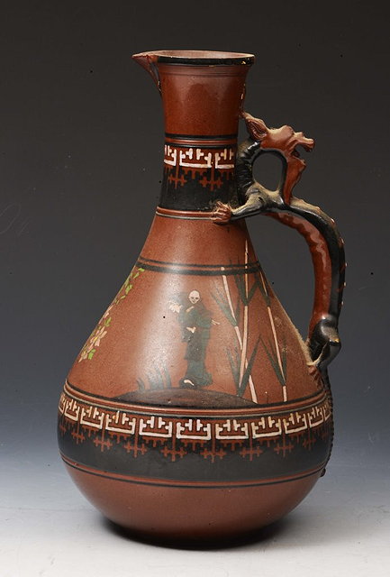 Appraisal: A WATCOMBE TERRACOTTA JUG designed by Christopher Dresser having a