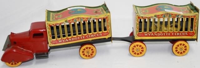 Appraisal: CA S WYANDOTTE TIN TOY LITHOGRAPH CIRCUSTRUCK AND WAGON PIECES