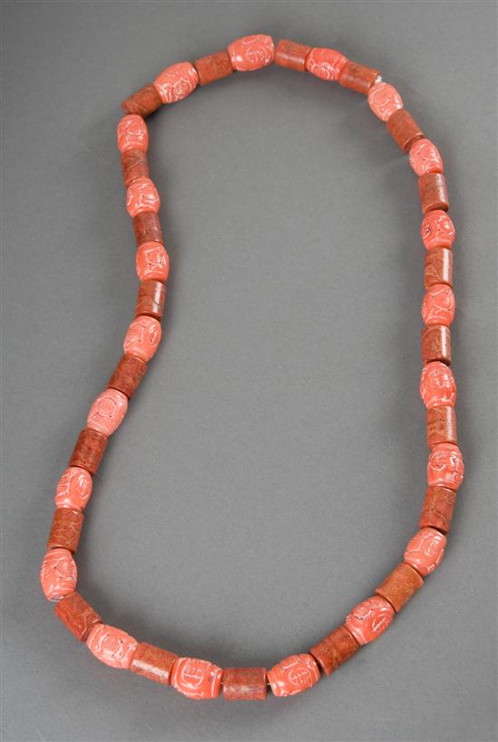 Appraisal: Chinese carved red coral necklace nd half th century Carved