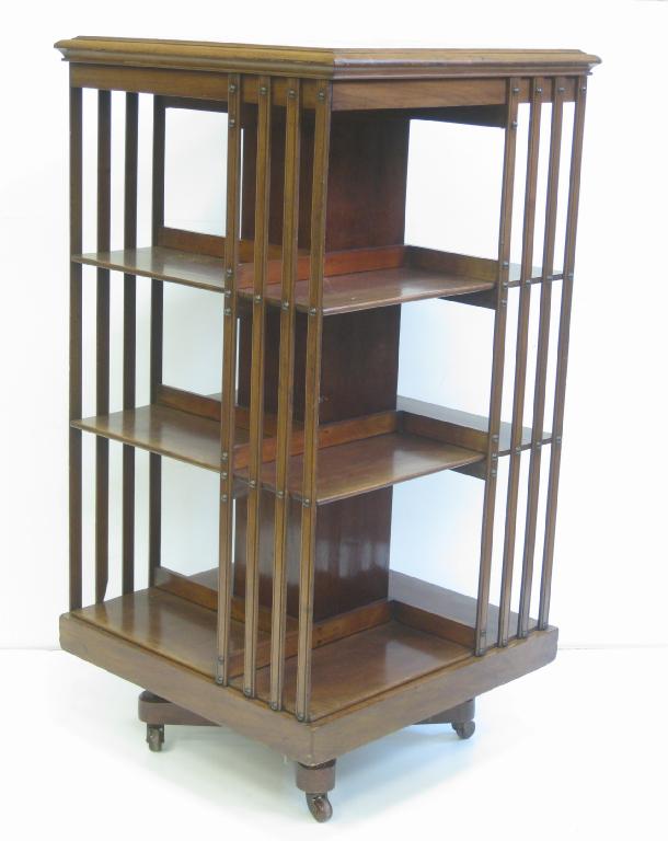 Appraisal: A th Century Georgian style walnut Revolving Bookcase with satinwood