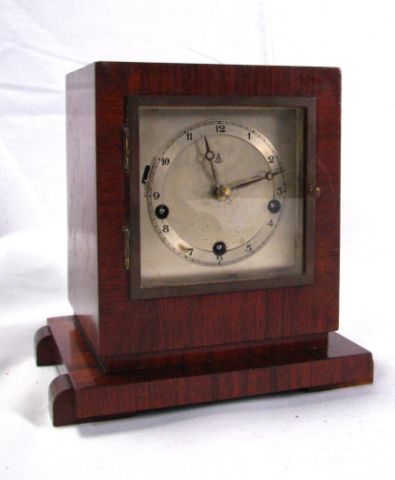 Appraisal: Art-deco style wood case clock German made inches high