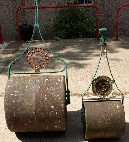 Appraisal: Two garden rollers one of small dimensions