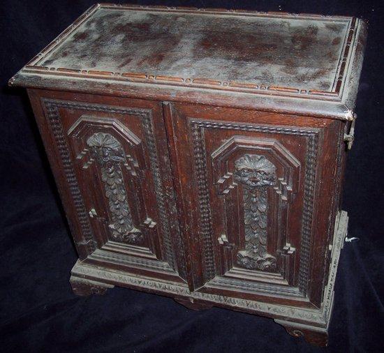 Appraisal: A collector's late th Century oak cabinet the rectangular top