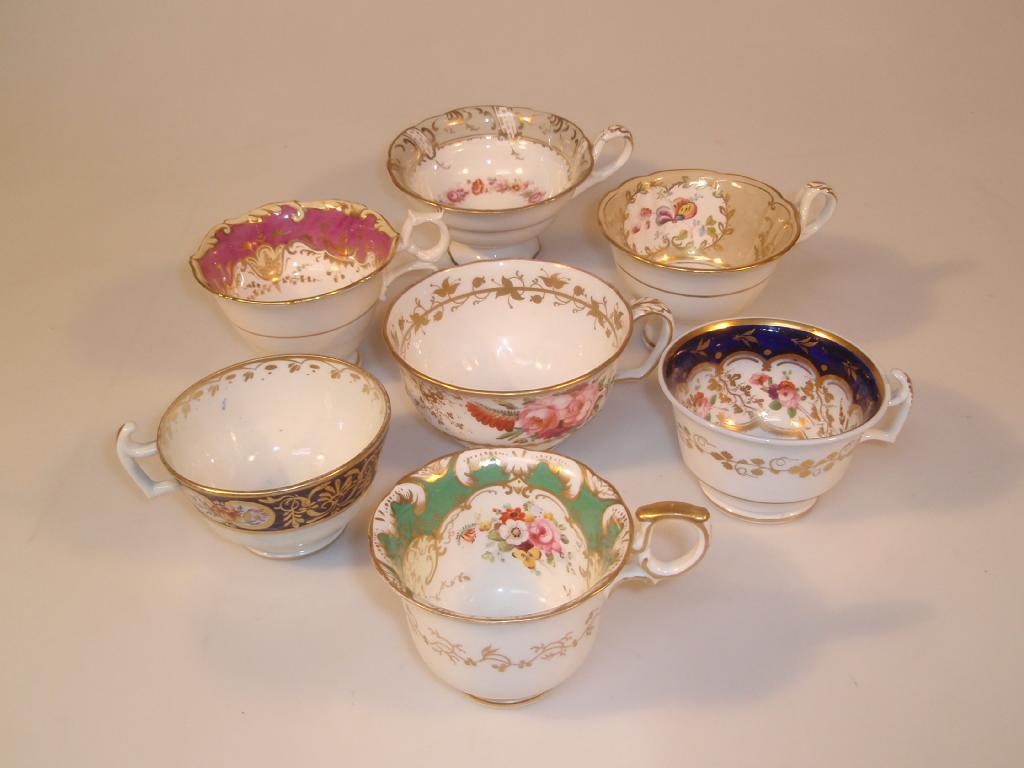 Appraisal: Seven thC porcelain tea cups each painted with various flowers