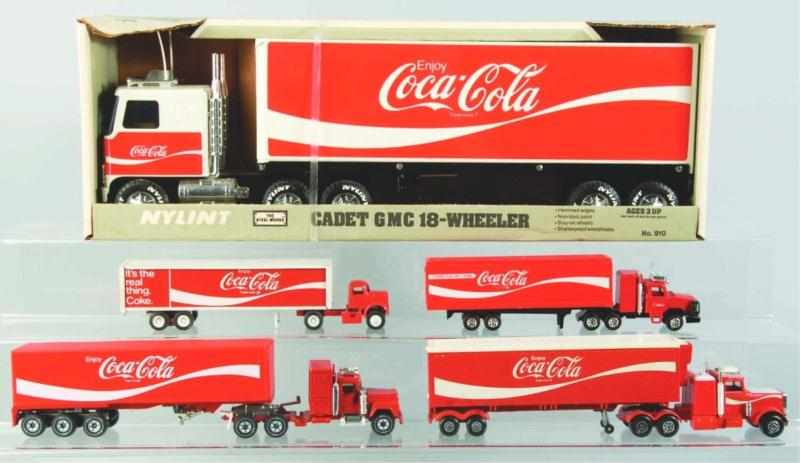 Appraisal: Lot of Coca-Cola Tractor Trailer Trucks Description Very clean group