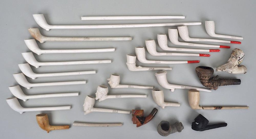 Appraisal: Group Clay Pipes including an American Indian figural pipe marked