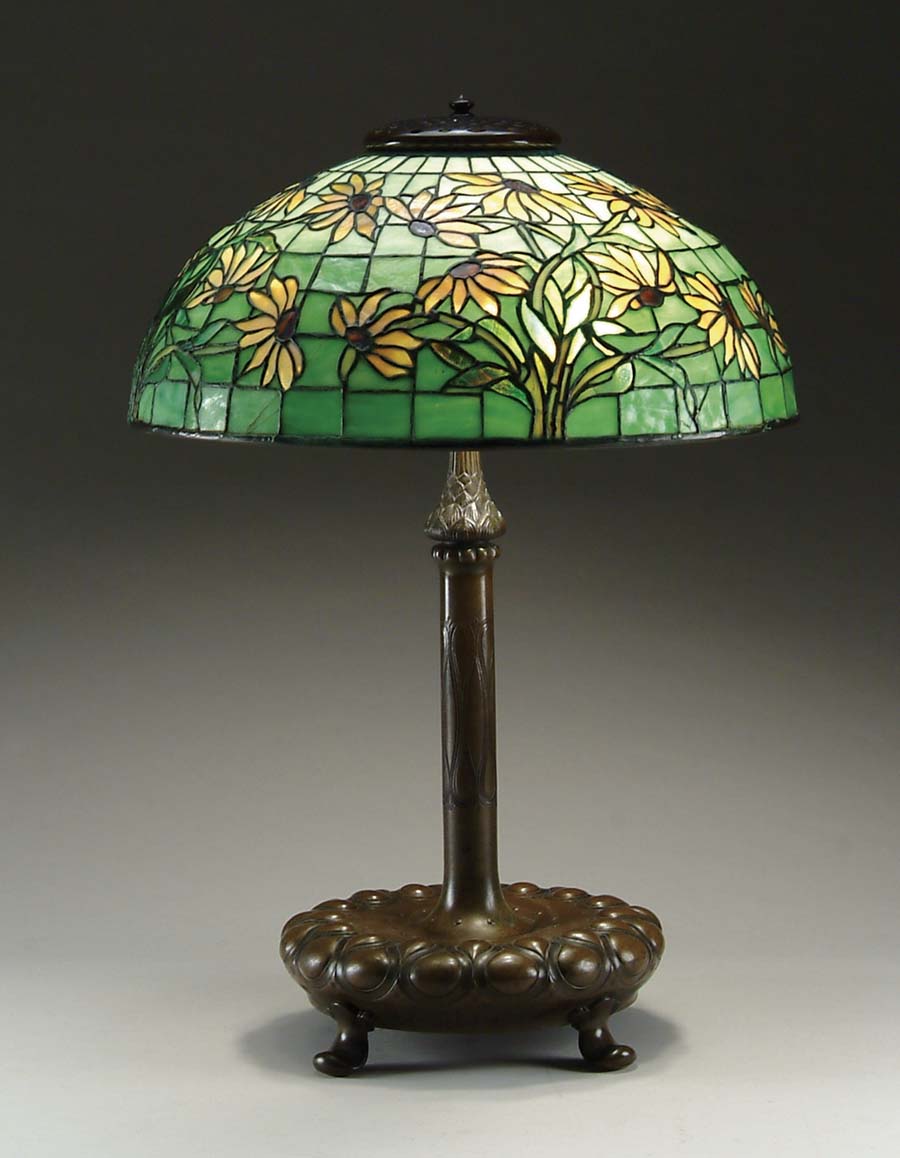 Appraisal: TIFFANY BLACK-EYED SUSAN LAMP Beautiful Tiffany shade features background glass