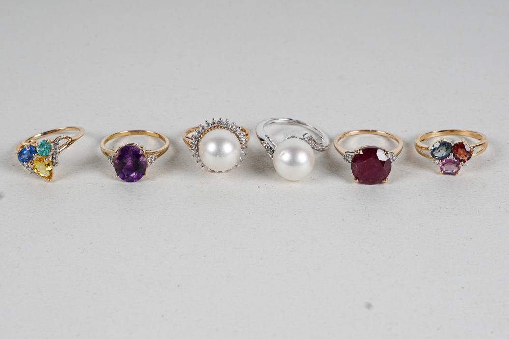 Appraisal: SIX ASSORTED KARAT YELLOW GOLD RINGSone ring containing one ruby