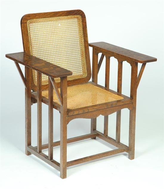 Appraisal: MISSION OAK CANED ARM CHAIR American early th century Good