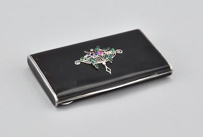 Appraisal: A European Art Deco Silver Enamel and Gemstone Case Silver